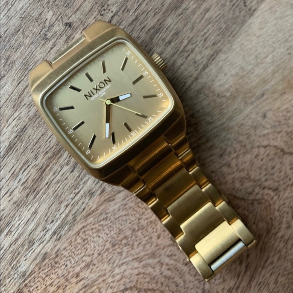 Nixon Men’s gold watch